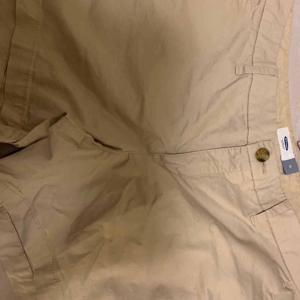 Tan shorts.